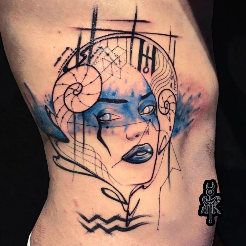 tatuagem grande de aquario nas costelas