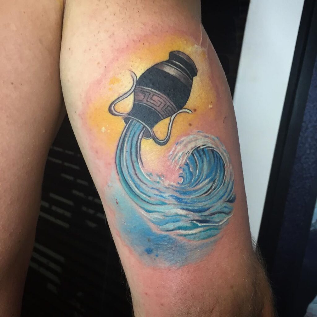 tattoo colorida de aquário