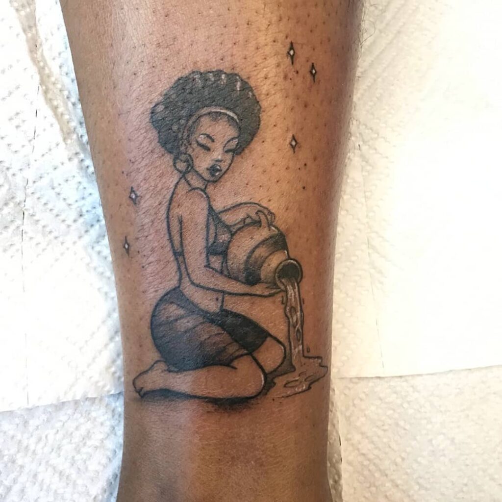 tatuagem de aquario em pele negra